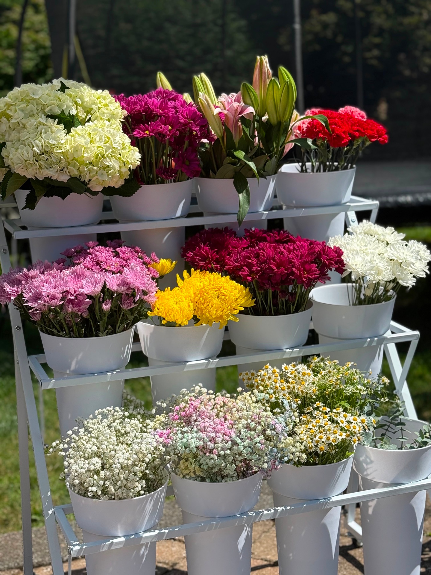 Soft Life Social Co. bloom bar tiered flower cart with hydrangeas, lilies and daisies